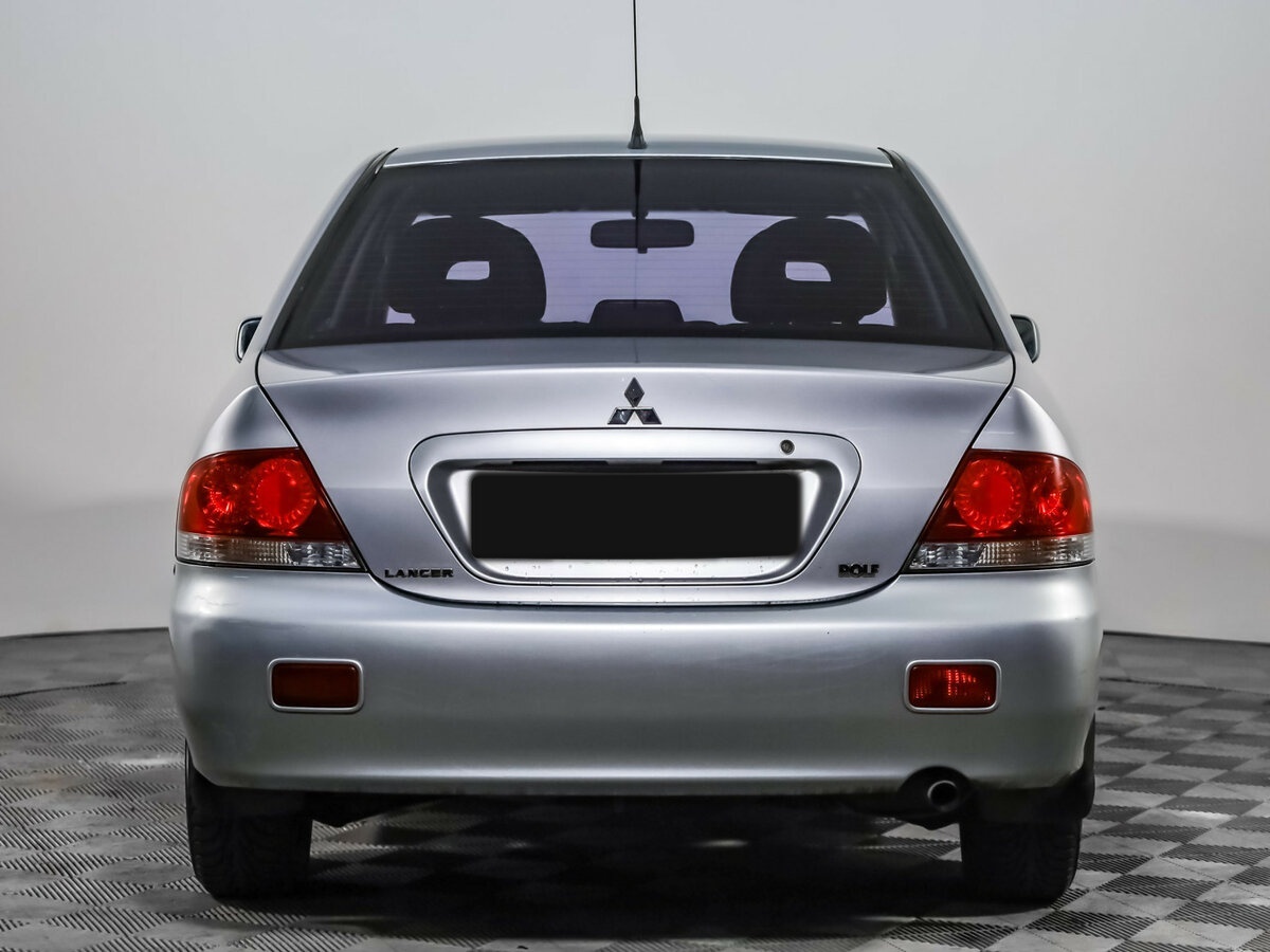 Купить Mitsubishi Lancer с пробегом. Фото: #4