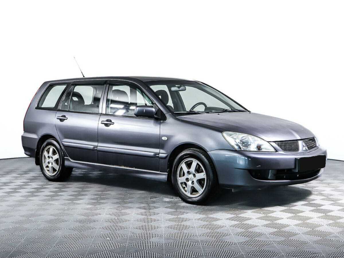 Купить Mitsubishi Lancer с пробегом. Фото: #2
