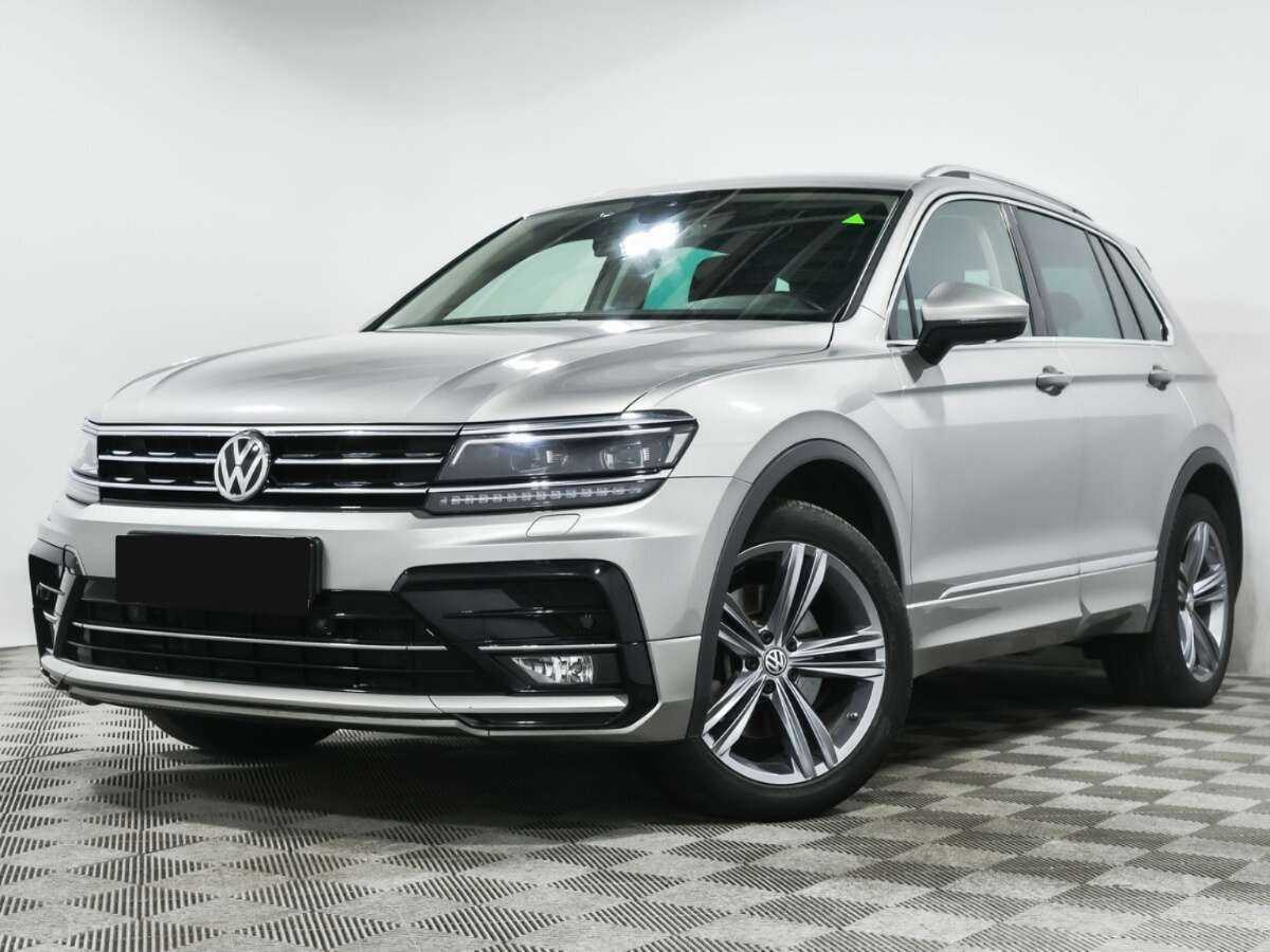 Купить Volkswagen Tiguan с пробегом. Посмотреть фото