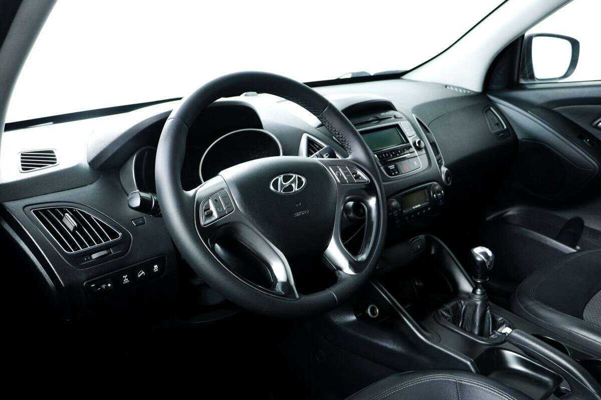Купить Hyundai ix35 с пробегом. Фото: #11