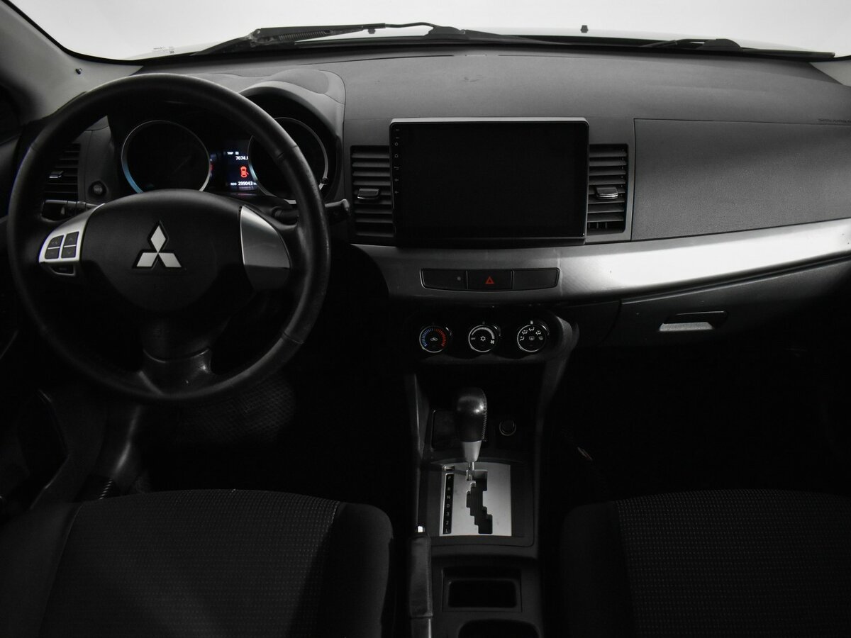 Купить Mitsubishi Lancer с пробегом. Фото: #10