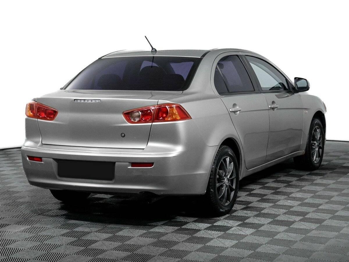 Купить Mitsubishi Lancer с пробегом. Фото: #4
