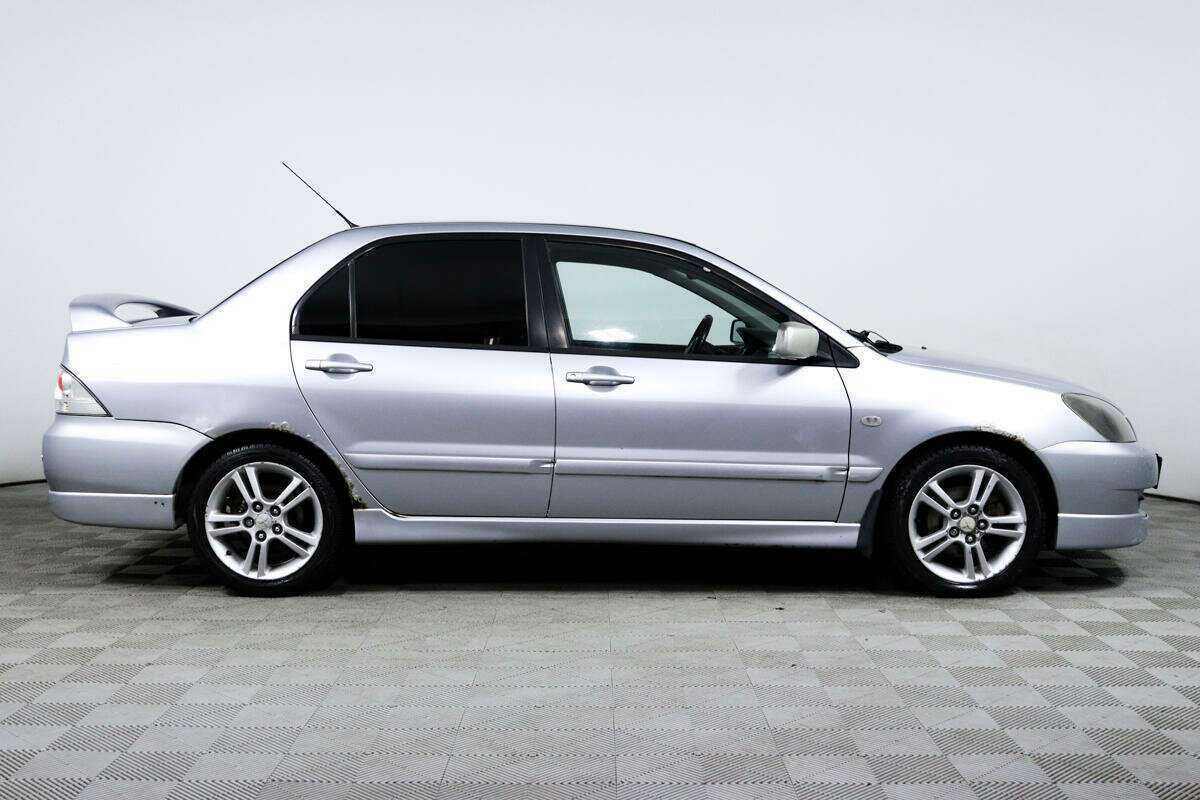 Купить Mitsubishi Lancer с пробегом. Фото: #3