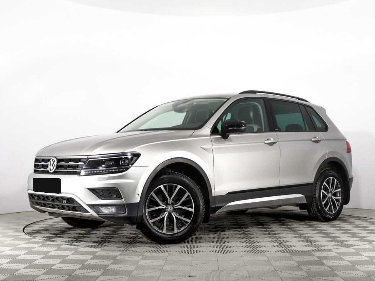 Купить Volkswagen Tiguan с пробегом. Посмотреть фото