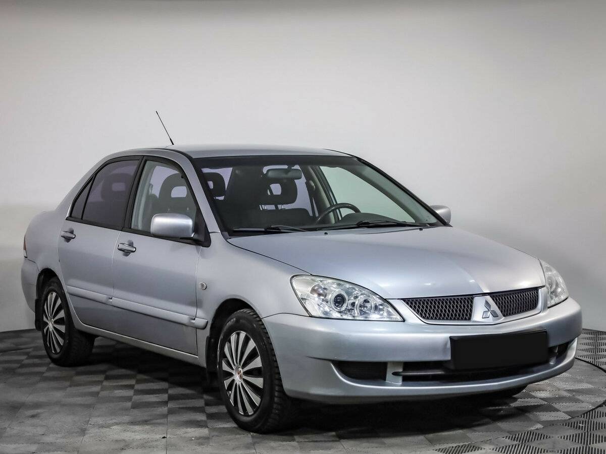 Купить Mitsubishi Lancer с пробегом. Фото: #2