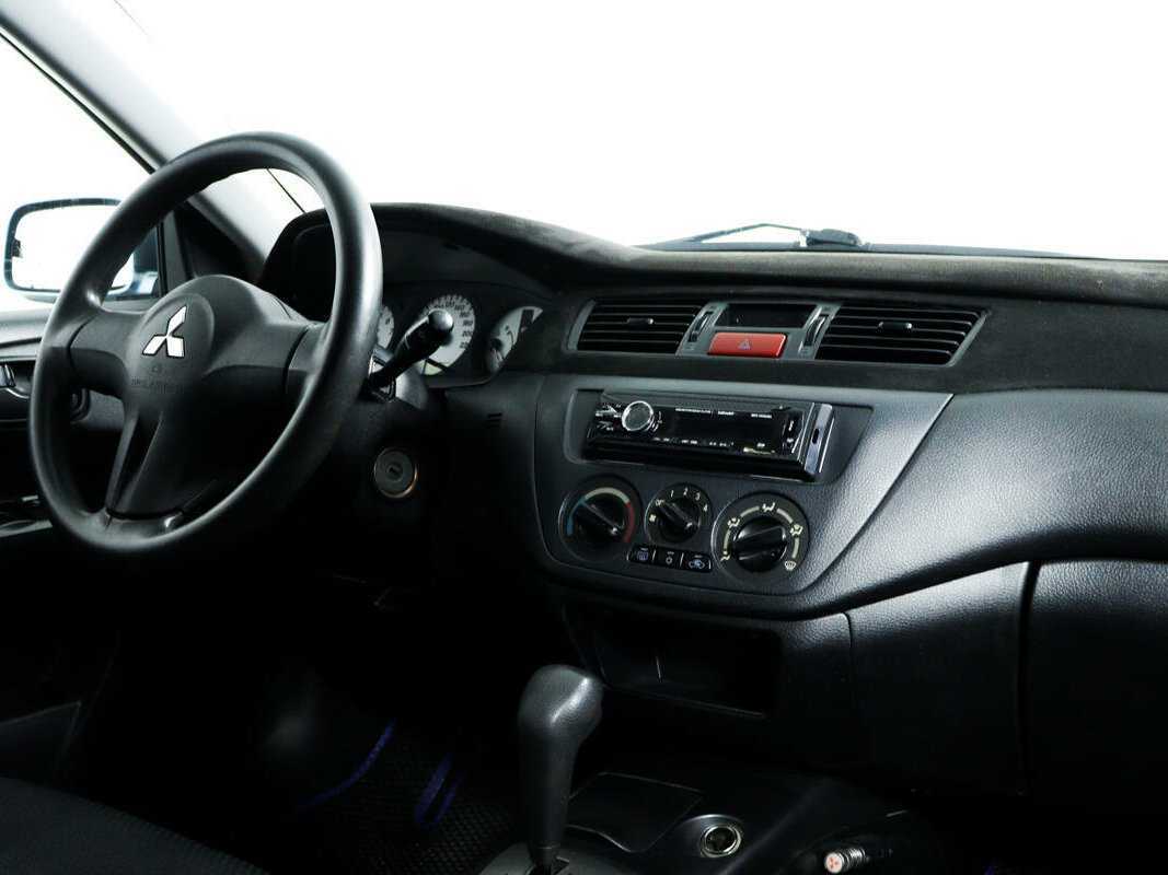 Купить Mitsubishi Lancer с пробегом. Фото: #8