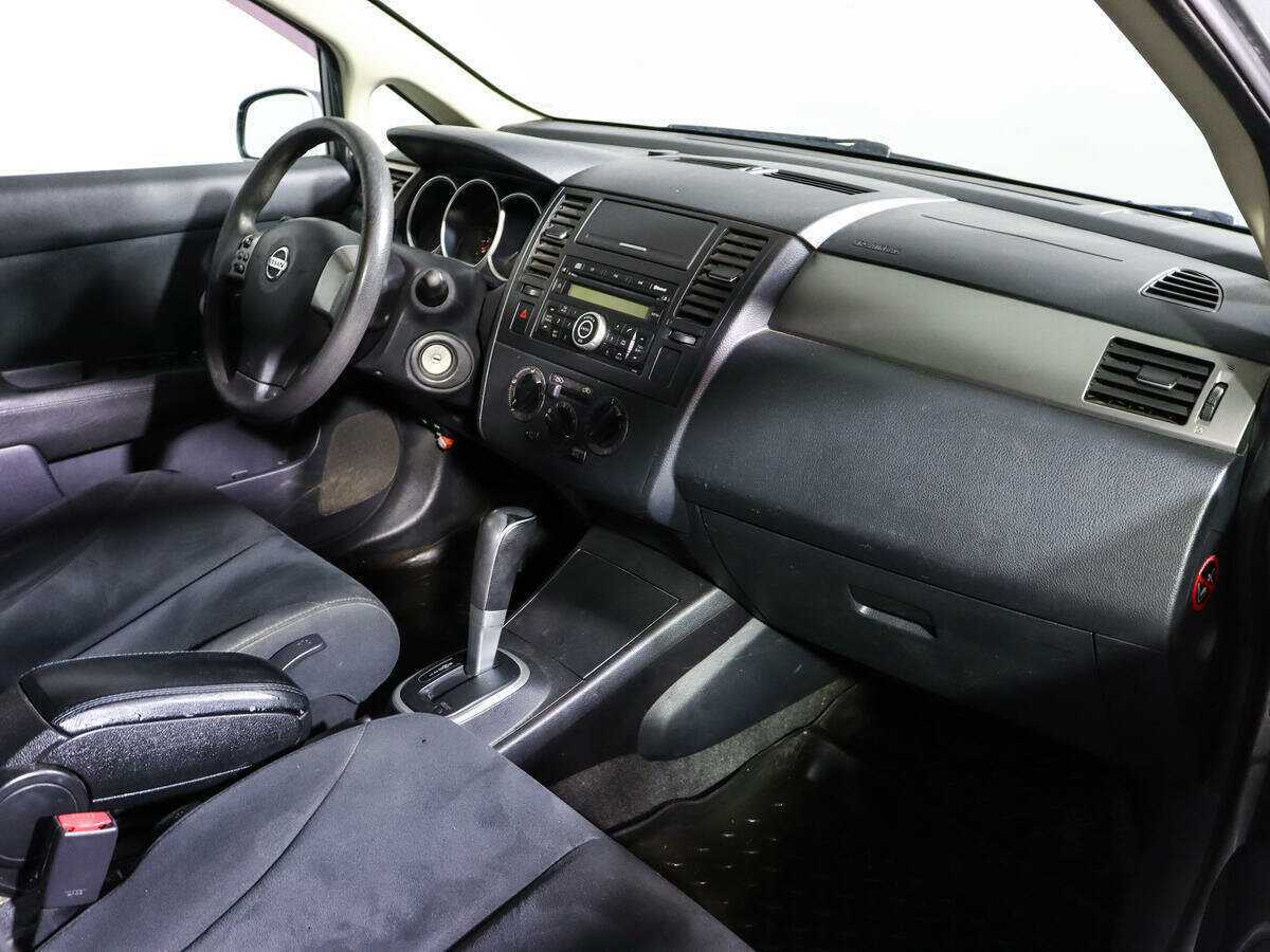 Купить Nissan Tiida с пробегом. Фото: #7