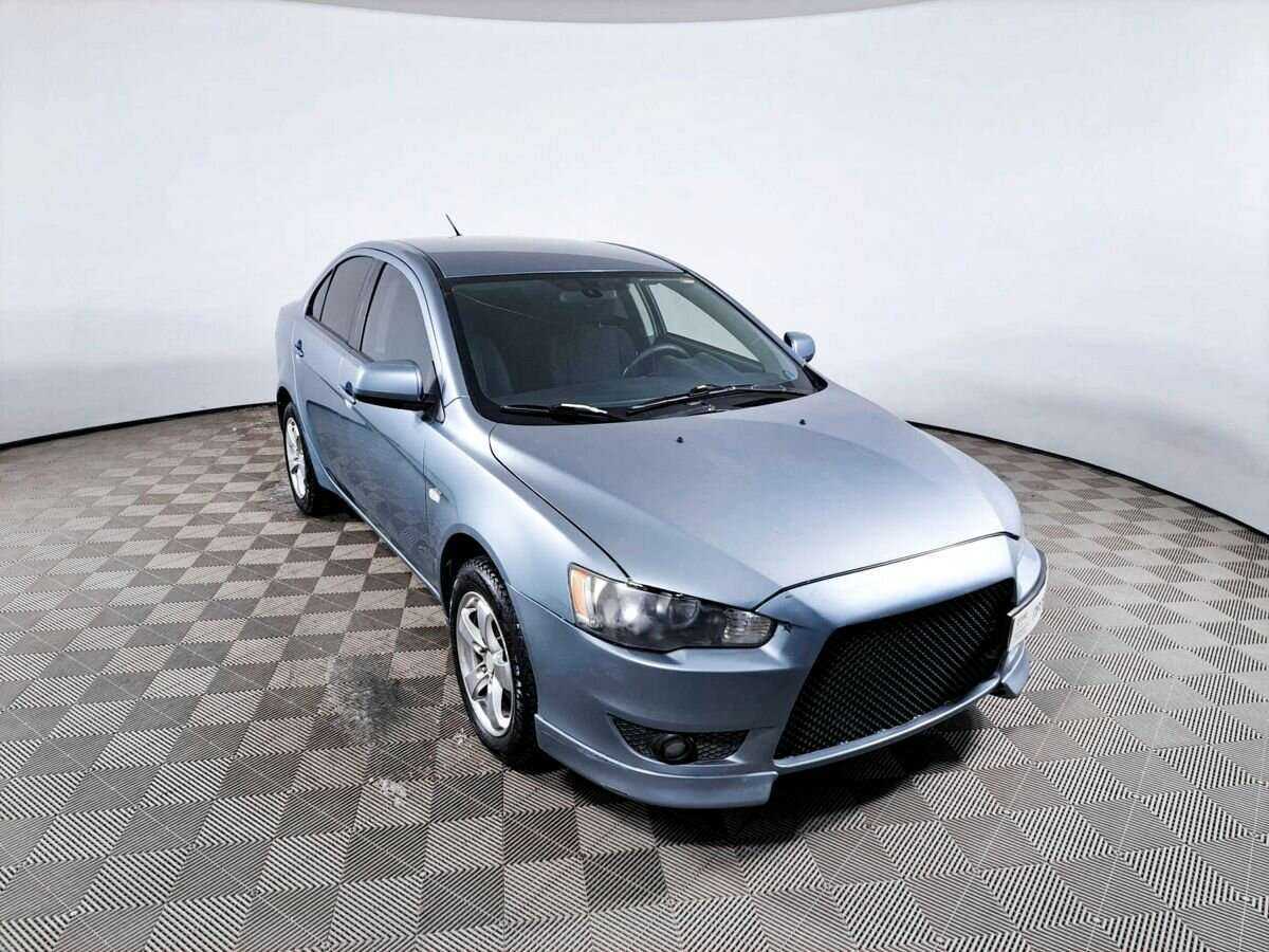 Купить Mitsubishi Lancer с пробегом. Фото: #2