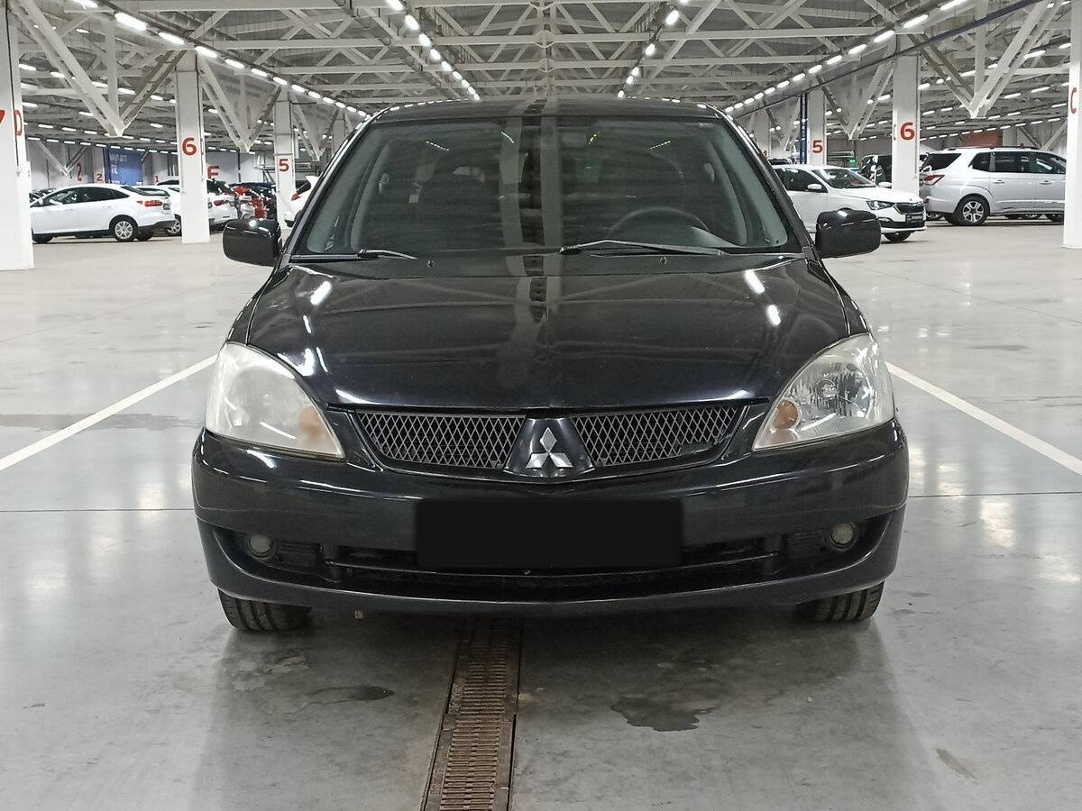 Купить Mitsubishi Lancer с пробегом. Фото: #1