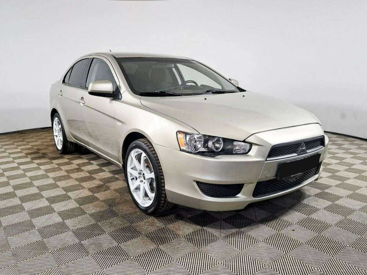 Купить Mitsubishi Lancer с пробегом. Фото: #2