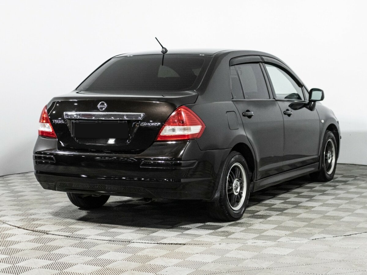 Купить Nissan Tiida с пробегом. Фото: #4