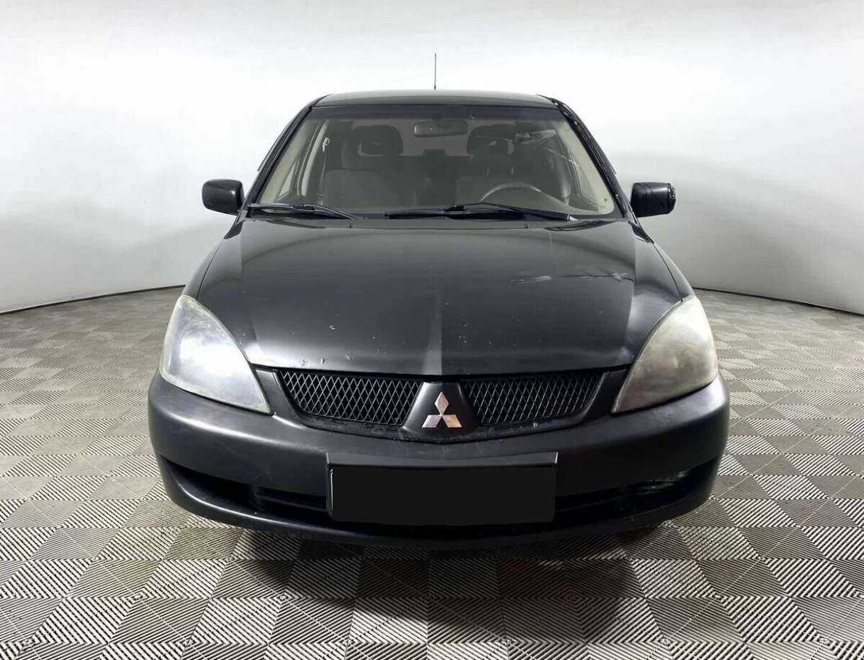 Купить Mitsubishi Lancer с пробегом. Фото: #1