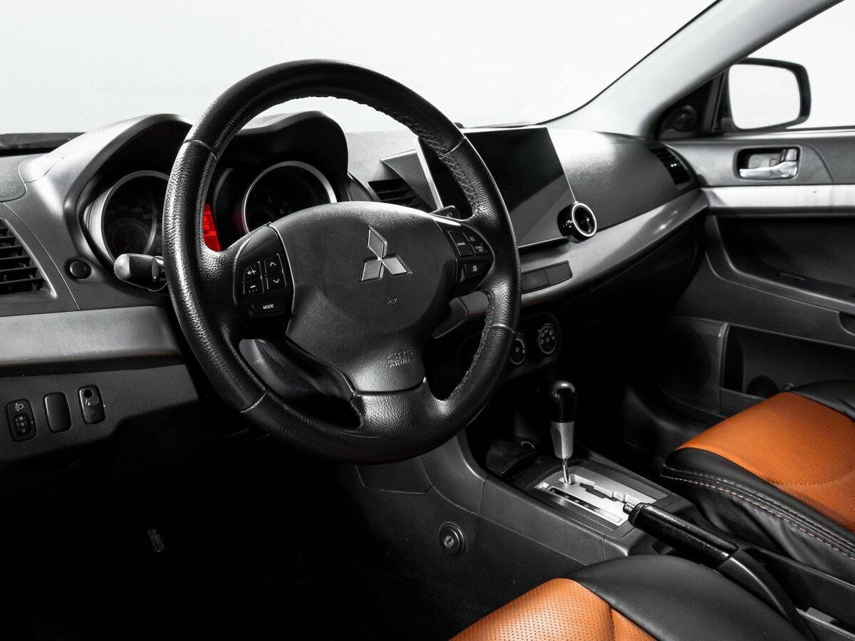 Купить Mitsubishi Lancer с пробегом. Фото: #13