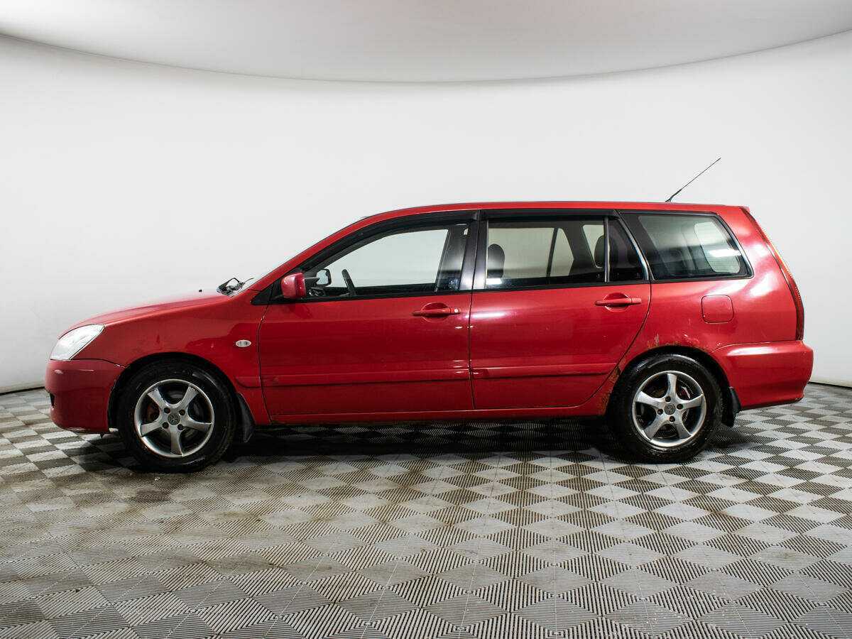 Купить Mitsubishi Lancer с пробегом. Фото: #7