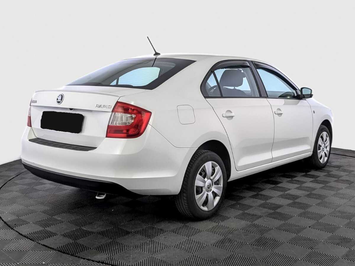 Купить Skoda Rapid с пробегом. Фото: #4