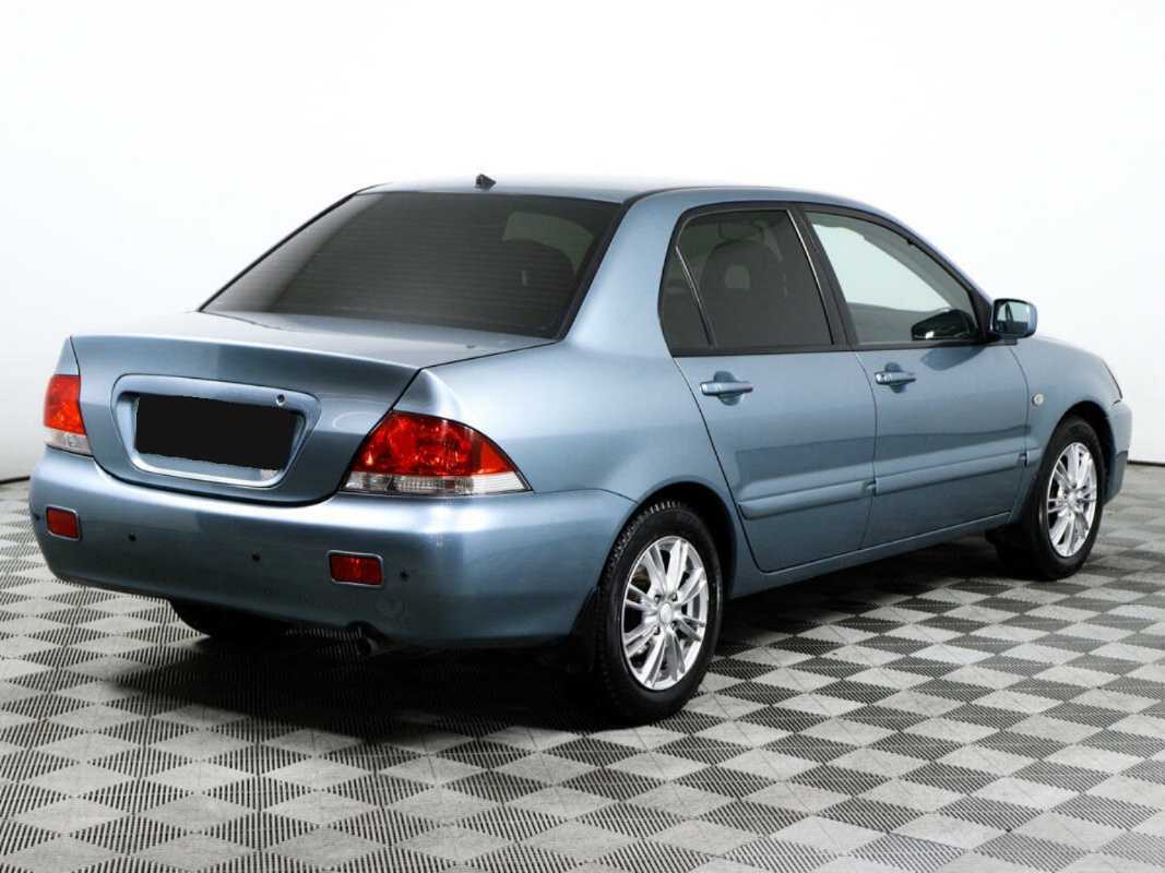 Купить Mitsubishi Lancer с пробегом. Фото: #4