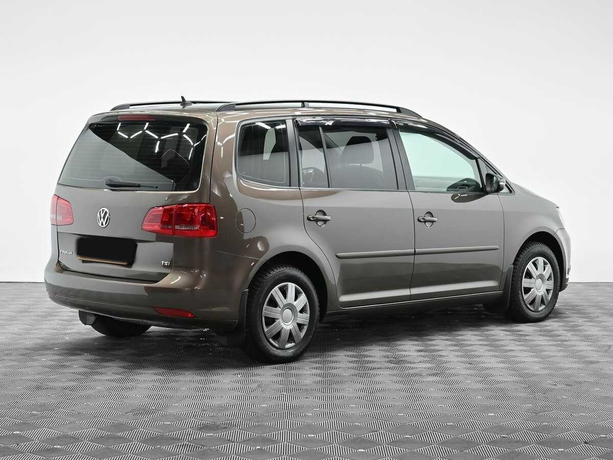 Купить Volkswagen Touran с пробегом. Фото: #2