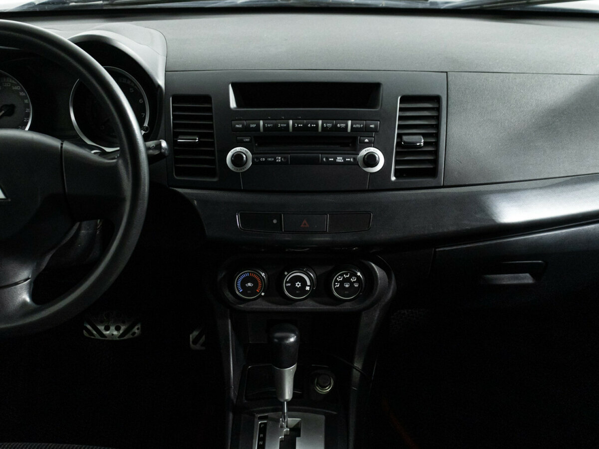 Купить Mitsubishi Lancer с пробегом. Фото: #13
