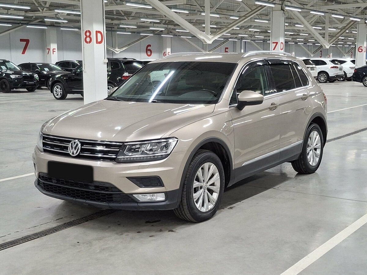 Купить Volkswagen Tiguan с пробегом. Посмотреть фото