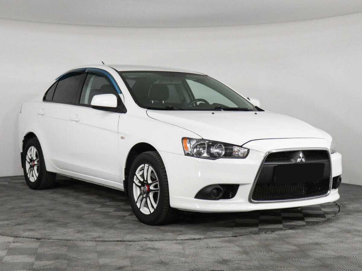 Купить Mitsubishi Lancer с пробегом. Фото: #2