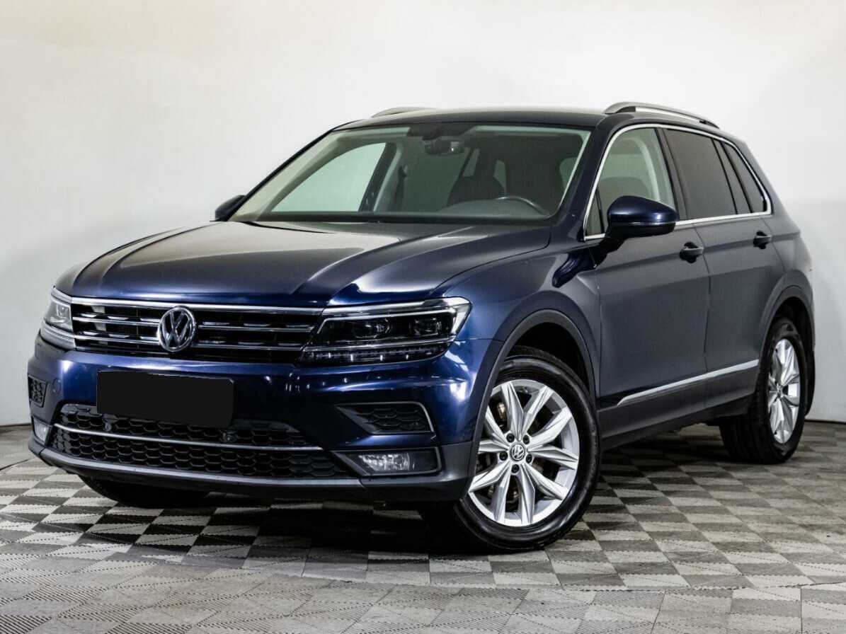 Купить Volkswagen Tiguan с пробегом. Посмотреть фото