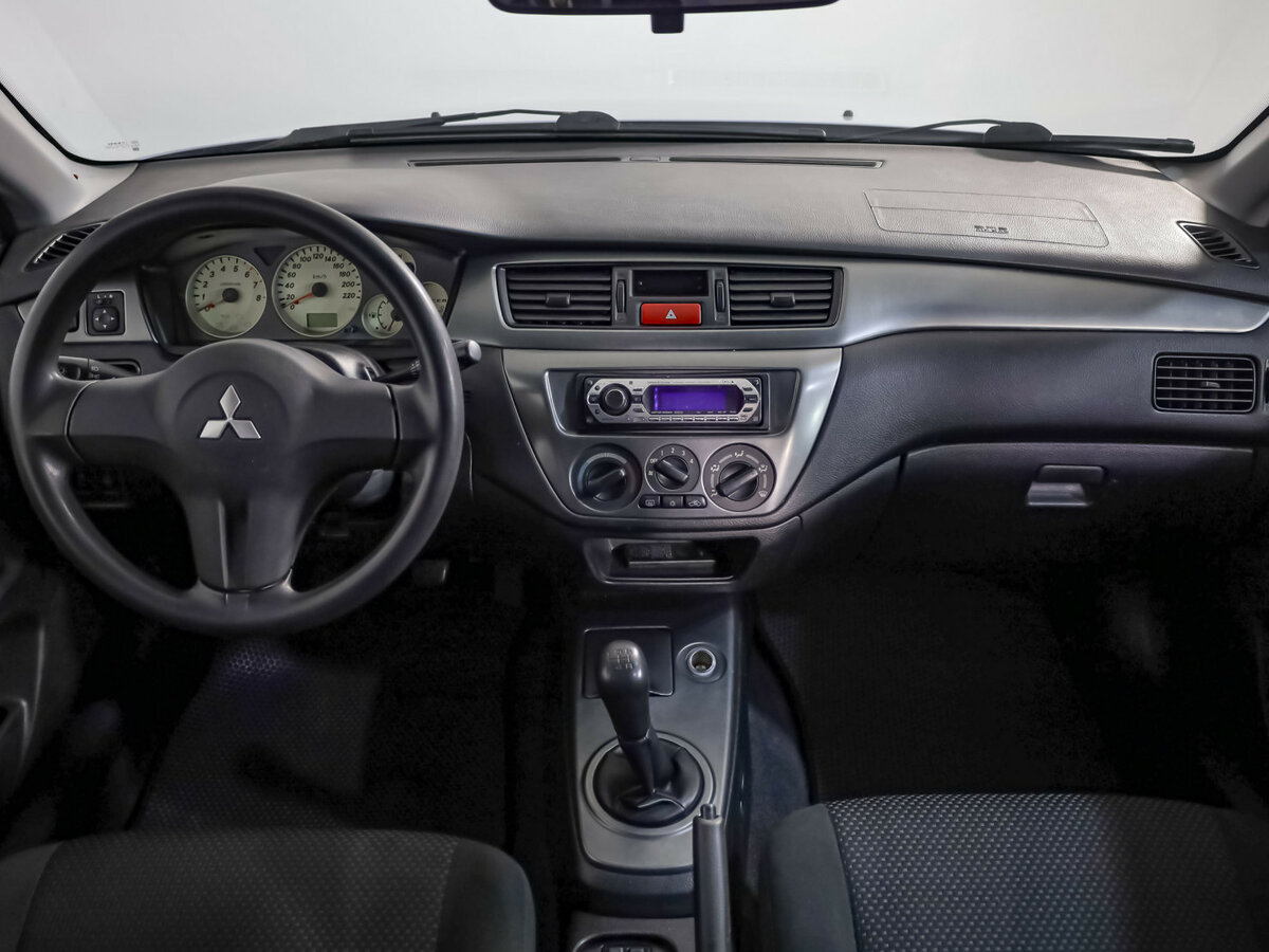Купить Mitsubishi Lancer с пробегом. Фото: #7