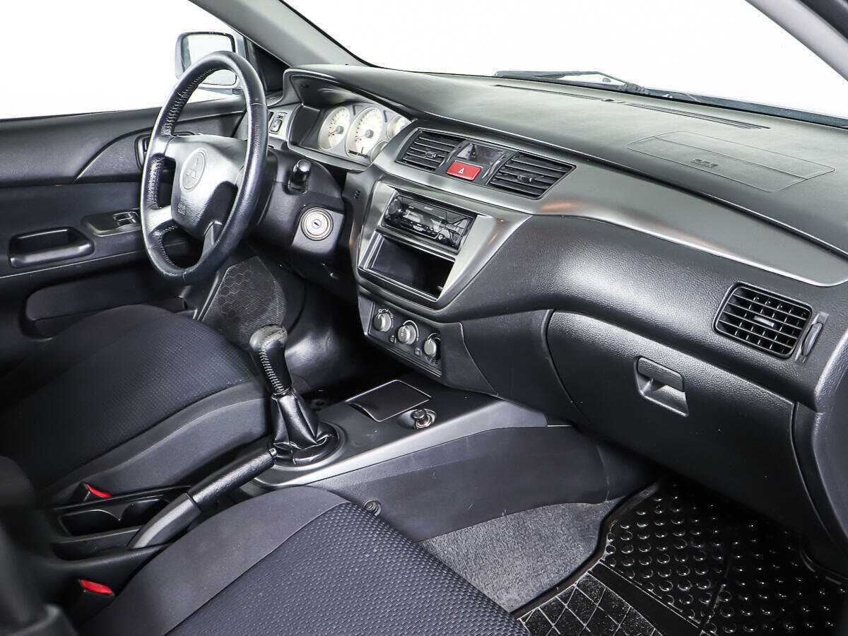 Купить Mitsubishi Lancer с пробегом. Фото: #8