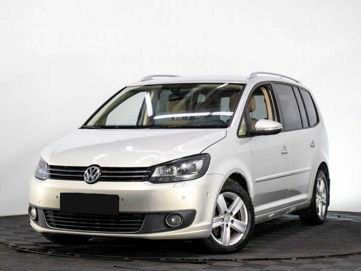 Купить Volkswagen Touran с пробегом. Посмотреть фото