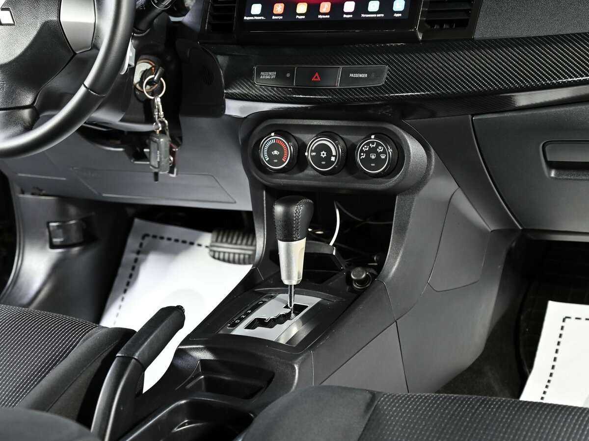 Купить Mitsubishi Lancer с пробегом. Фото: #11