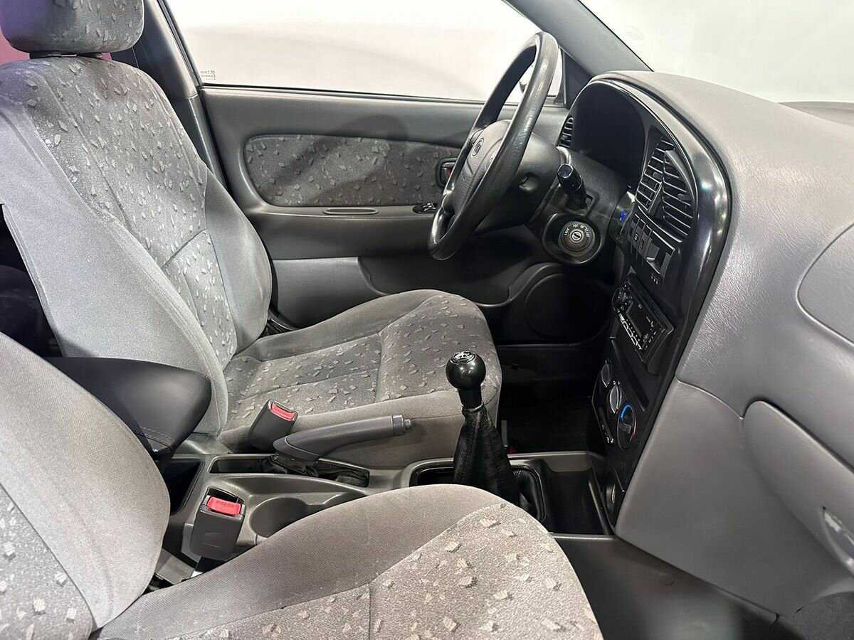 Купить Kia Spectra с пробегом. Фото: #9