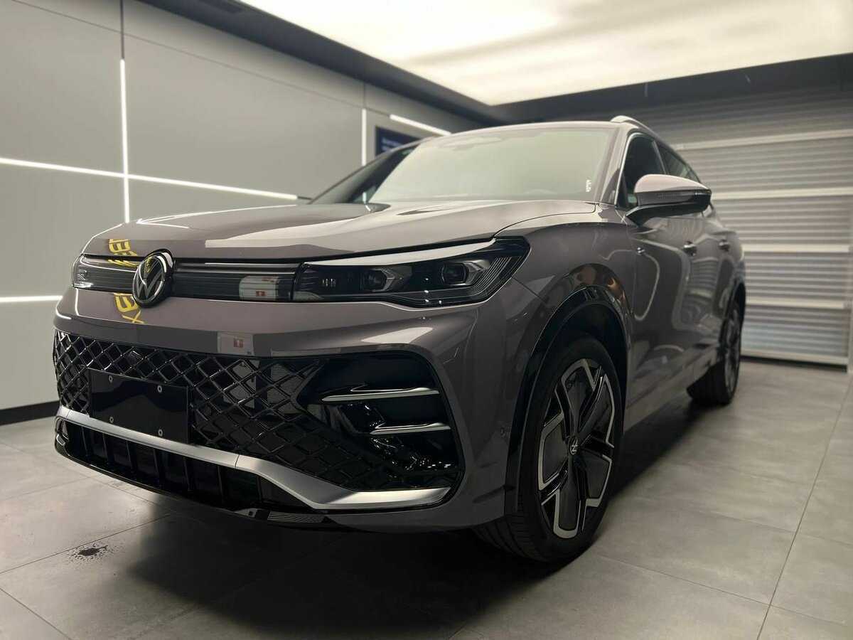 Купить Volkswagen Tiguan с пробегом. Посмотреть фото