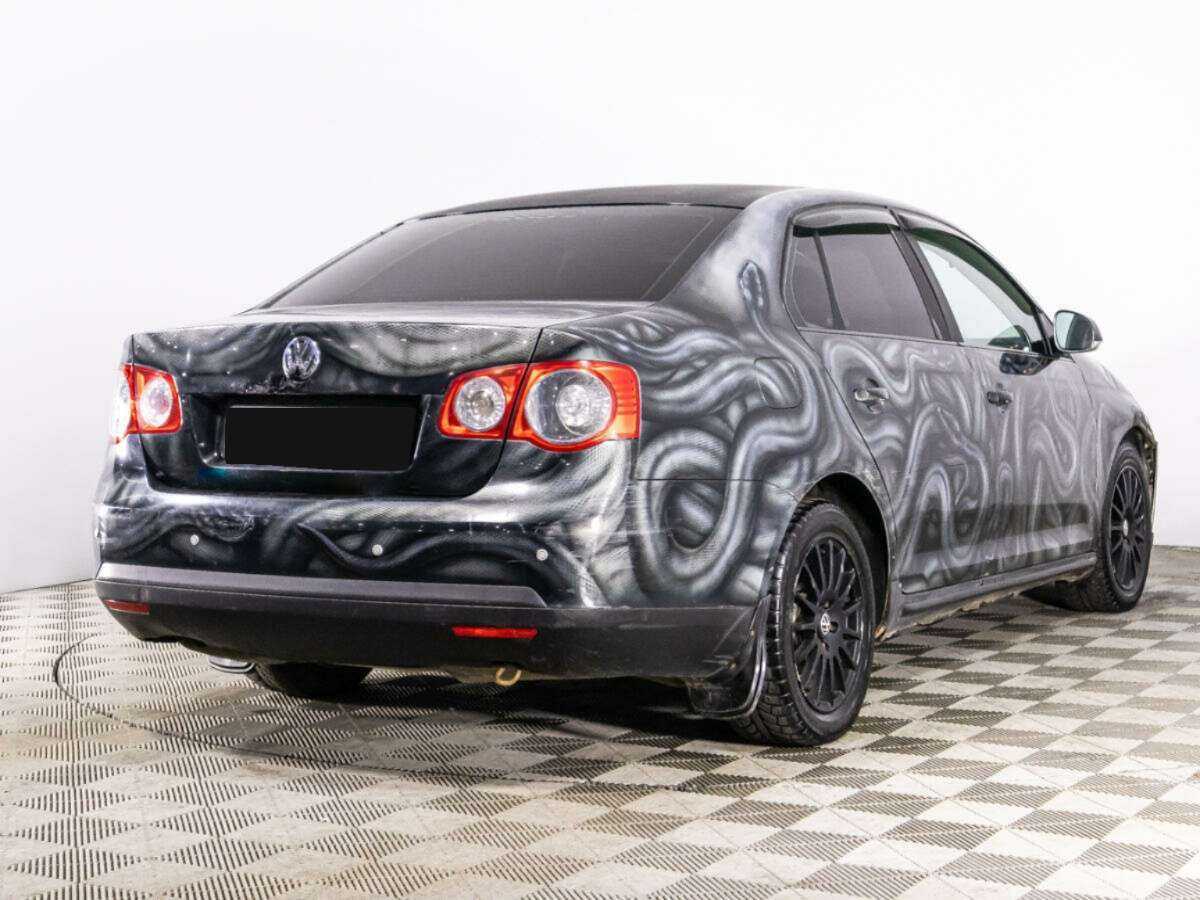 Купить Volkswagen Jetta с пробегом. Фото: #4