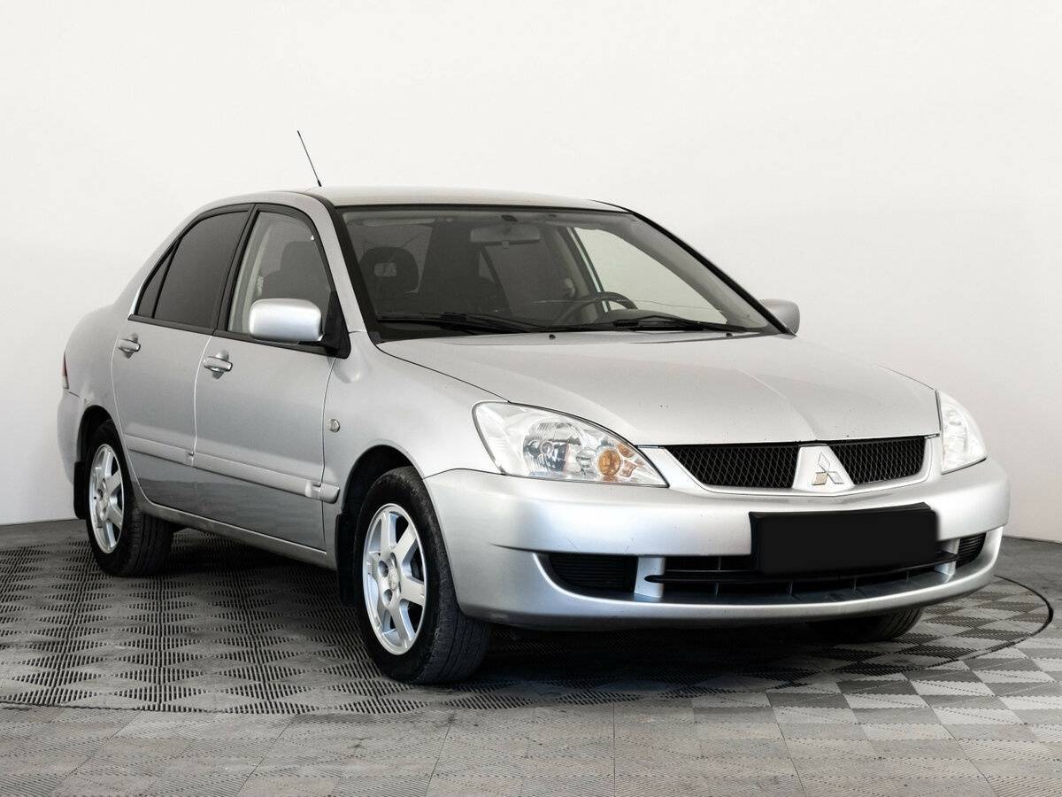 Купить Mitsubishi Lancer с пробегом. Фото: #2