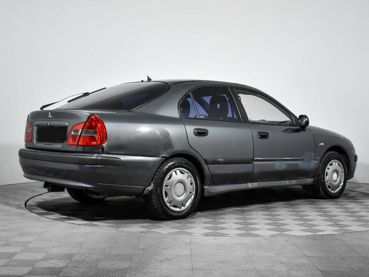 Купить Mitsubishi Carisma с пробегом. Фото: #4
