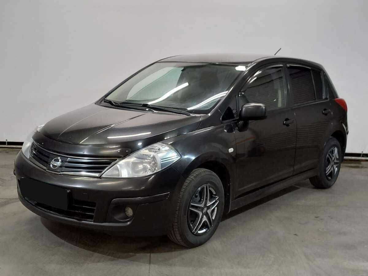 Купить Nissan Tiida с пробегом. Посмотреть фото