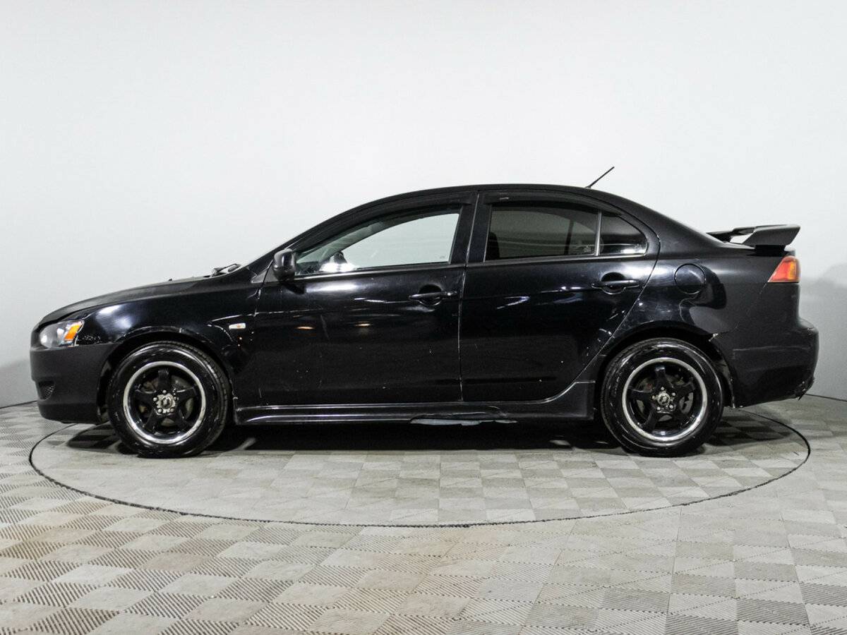 Купить Mitsubishi Lancer с пробегом. Фото: #7