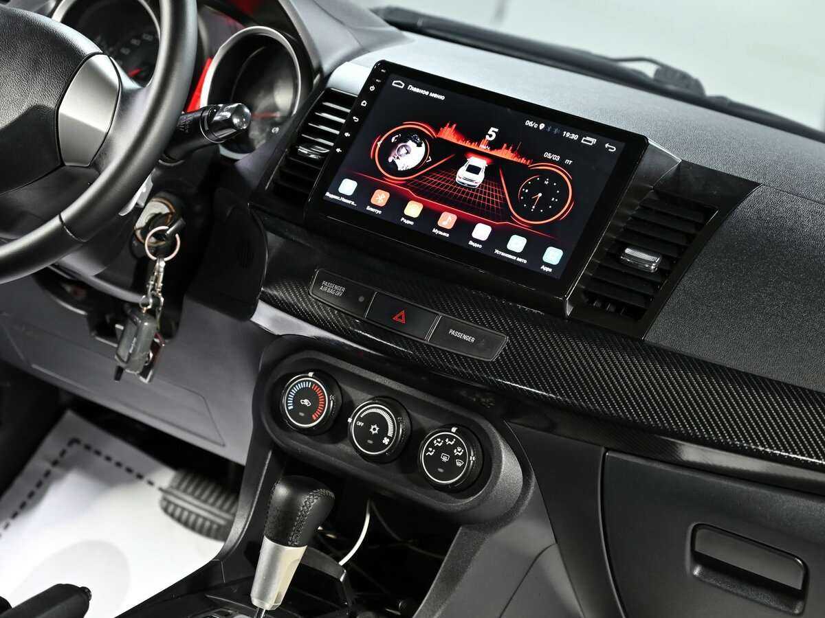 Купить Mitsubishi Lancer с пробегом. Фото: #9