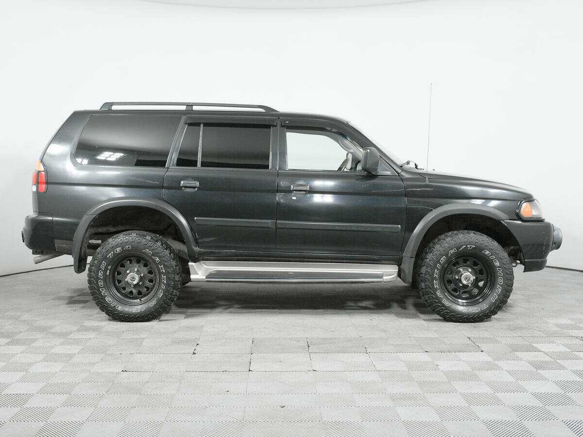 Купить Mitsubishi Montero Sport с пробегом. Фото: #3