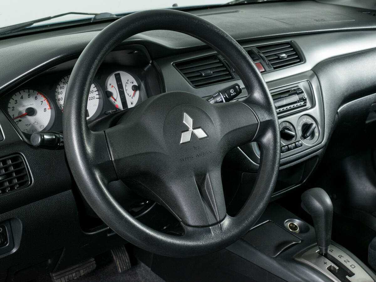 Купить Mitsubishi Lancer с пробегом. Фото: #13