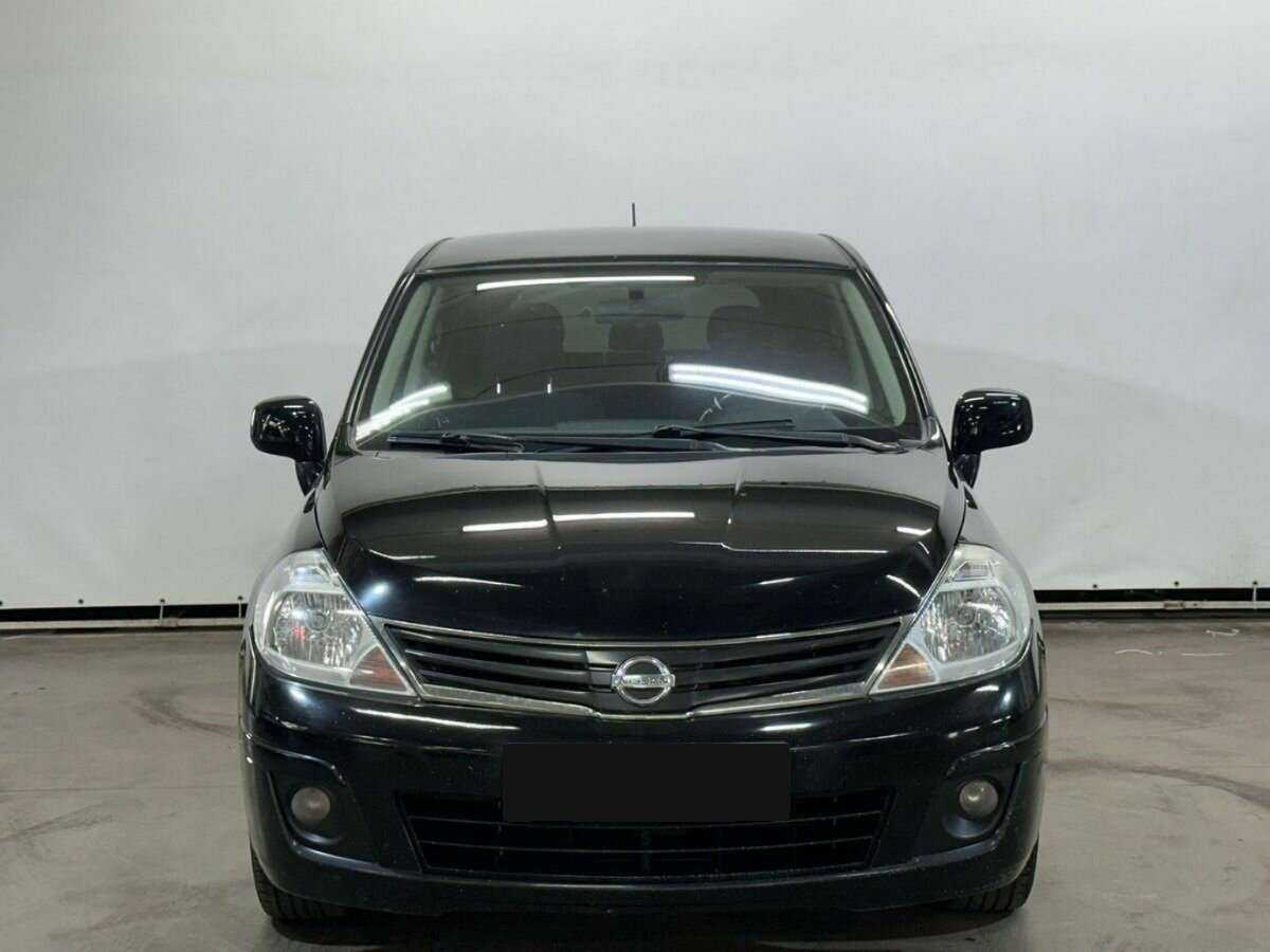 Купить Nissan Tiida с пробегом. Фото: #1