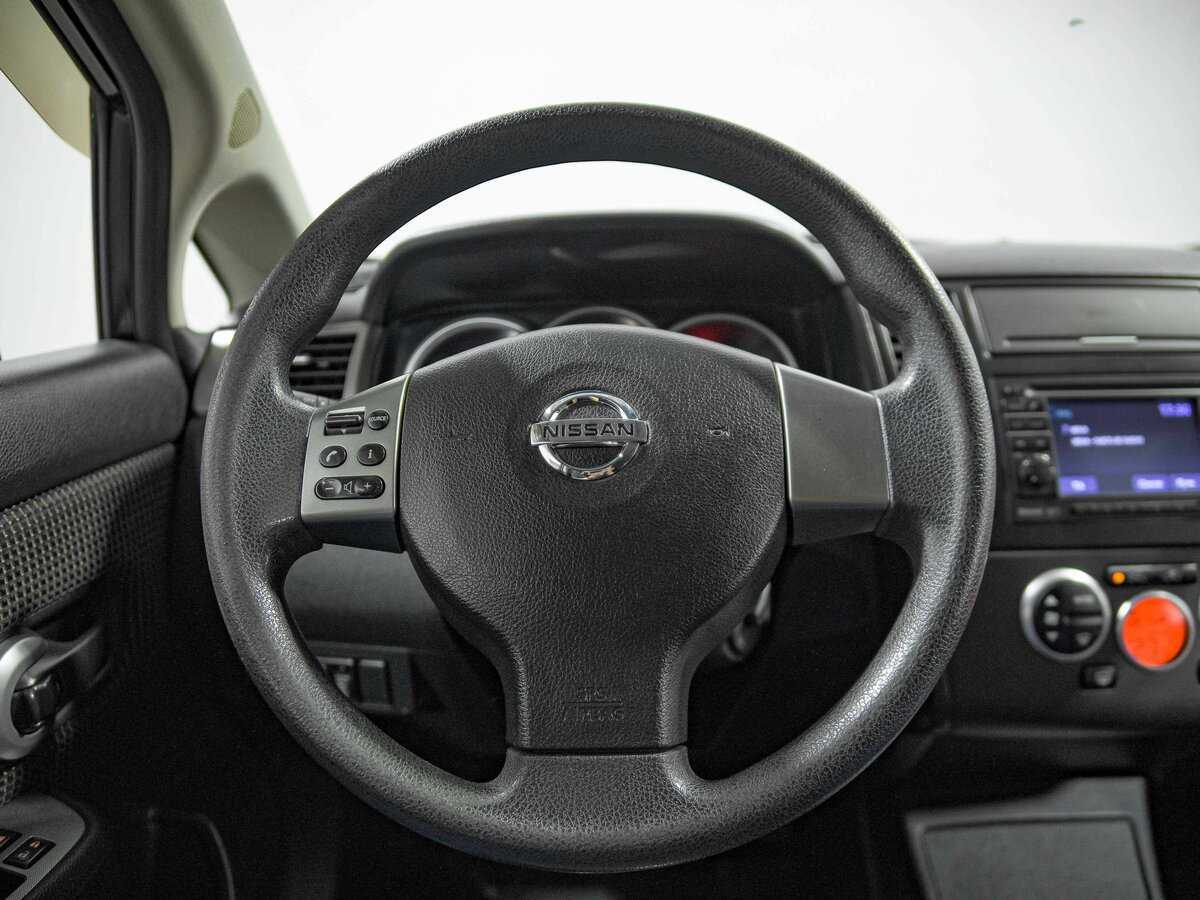 Купить Nissan Tiida с пробегом. Фото: #8