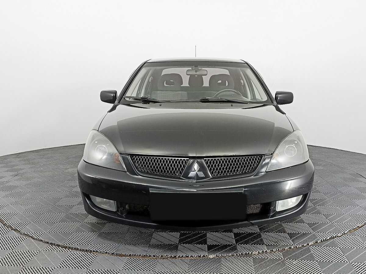 Купить Mitsubishi Lancer с пробегом. Фото: #1