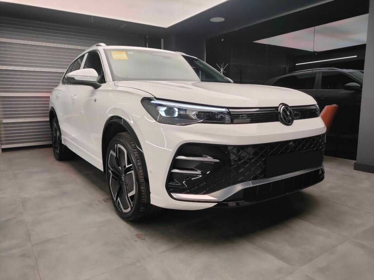 Купить Volkswagen Tiguan с пробегом. Фото: #2