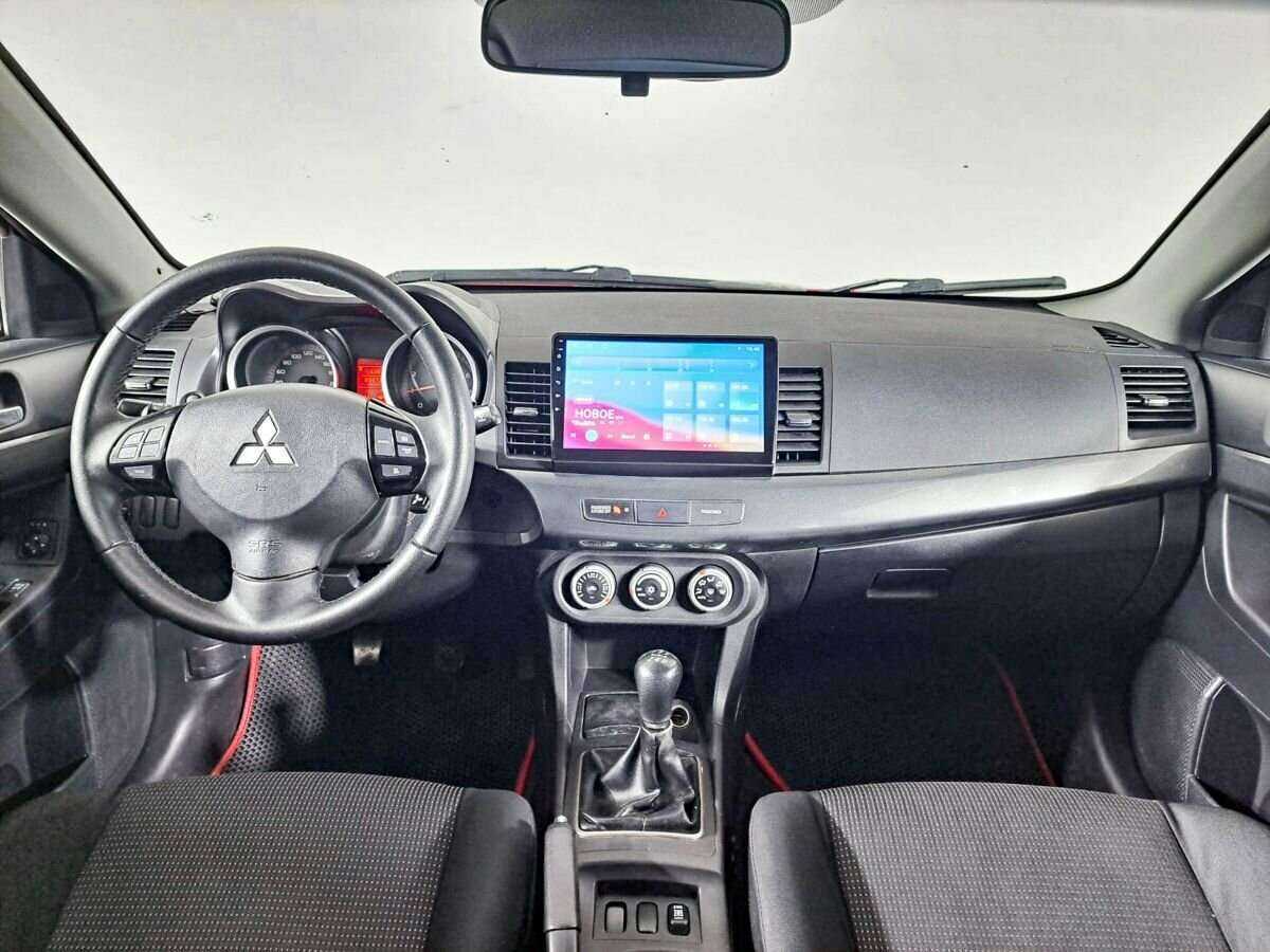 Купить Mitsubishi Lancer с пробегом. Фото: #9