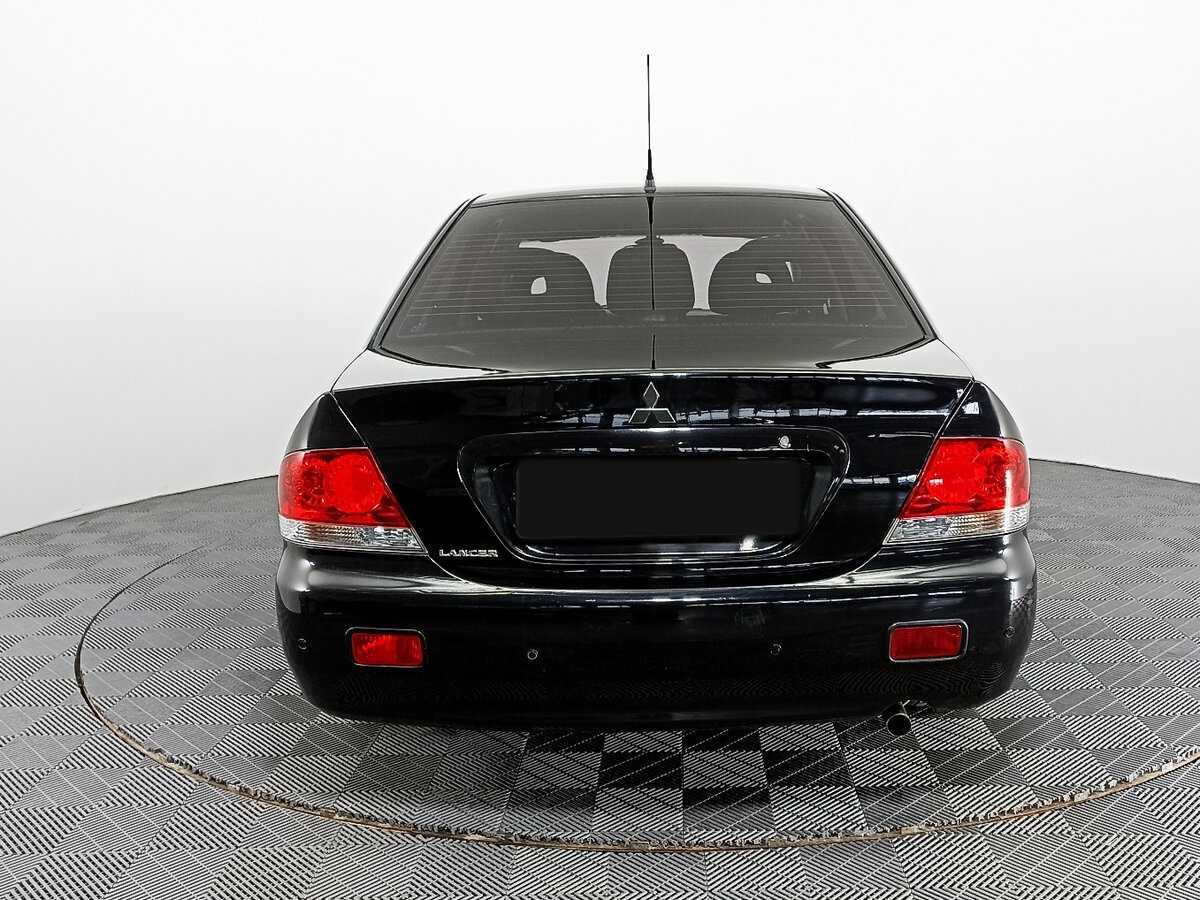 Купить Mitsubishi Lancer с пробегом. Фото: #5