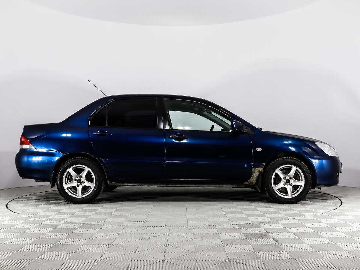 Купить Mitsubishi Lancer с пробегом. Фото: #3