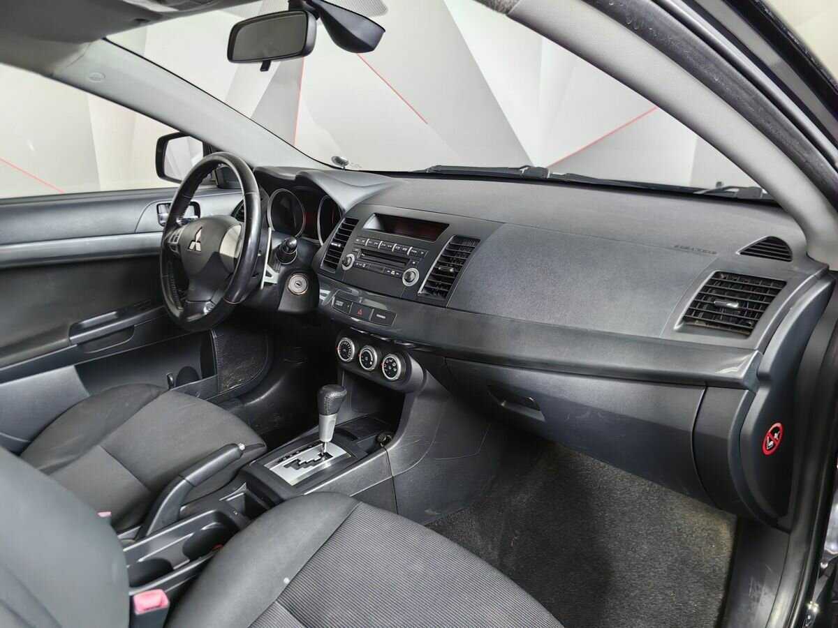Купить Mitsubishi Lancer с пробегом. Фото: #8