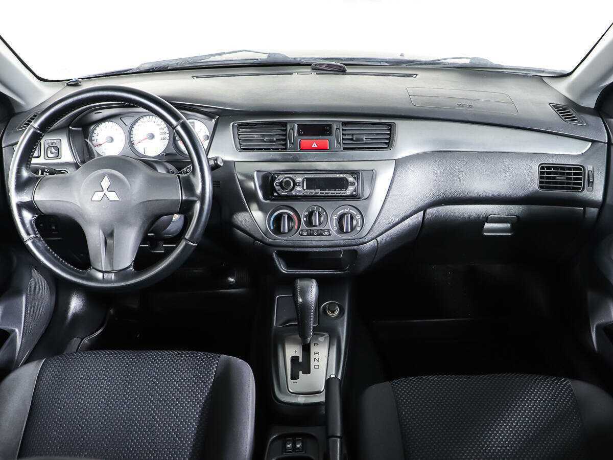Купить Mitsubishi Lancer с пробегом. Фото: #10