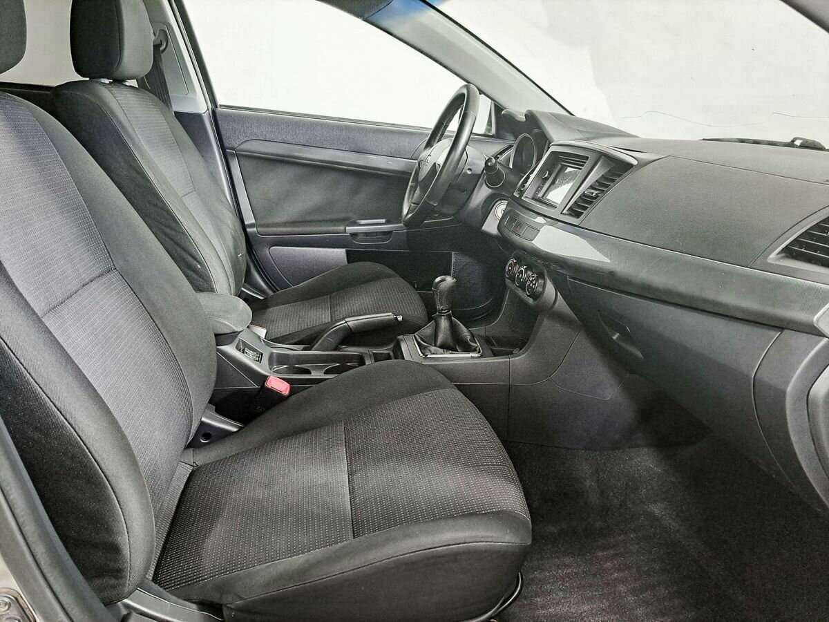 Купить Mitsubishi Lancer с пробегом. Фото: #8