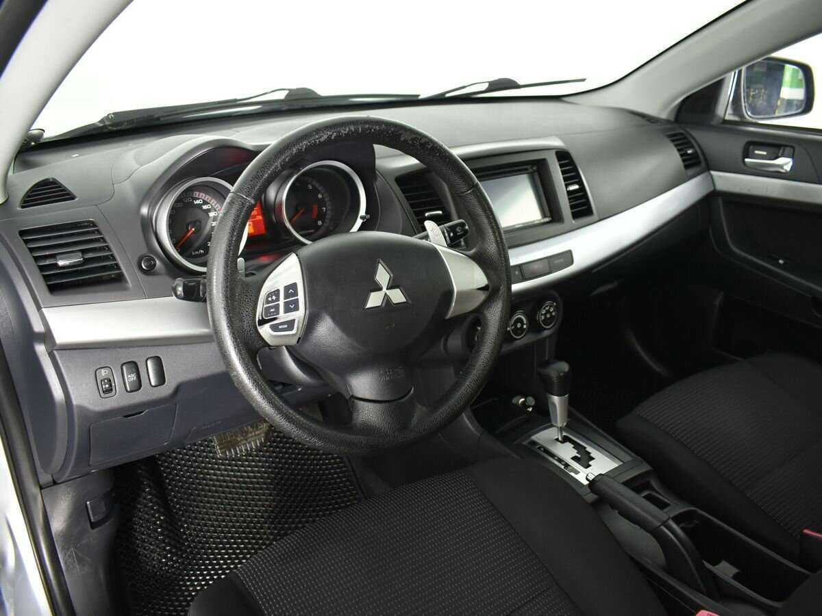 Купить Mitsubishi Lancer с пробегом. Фото: #7
